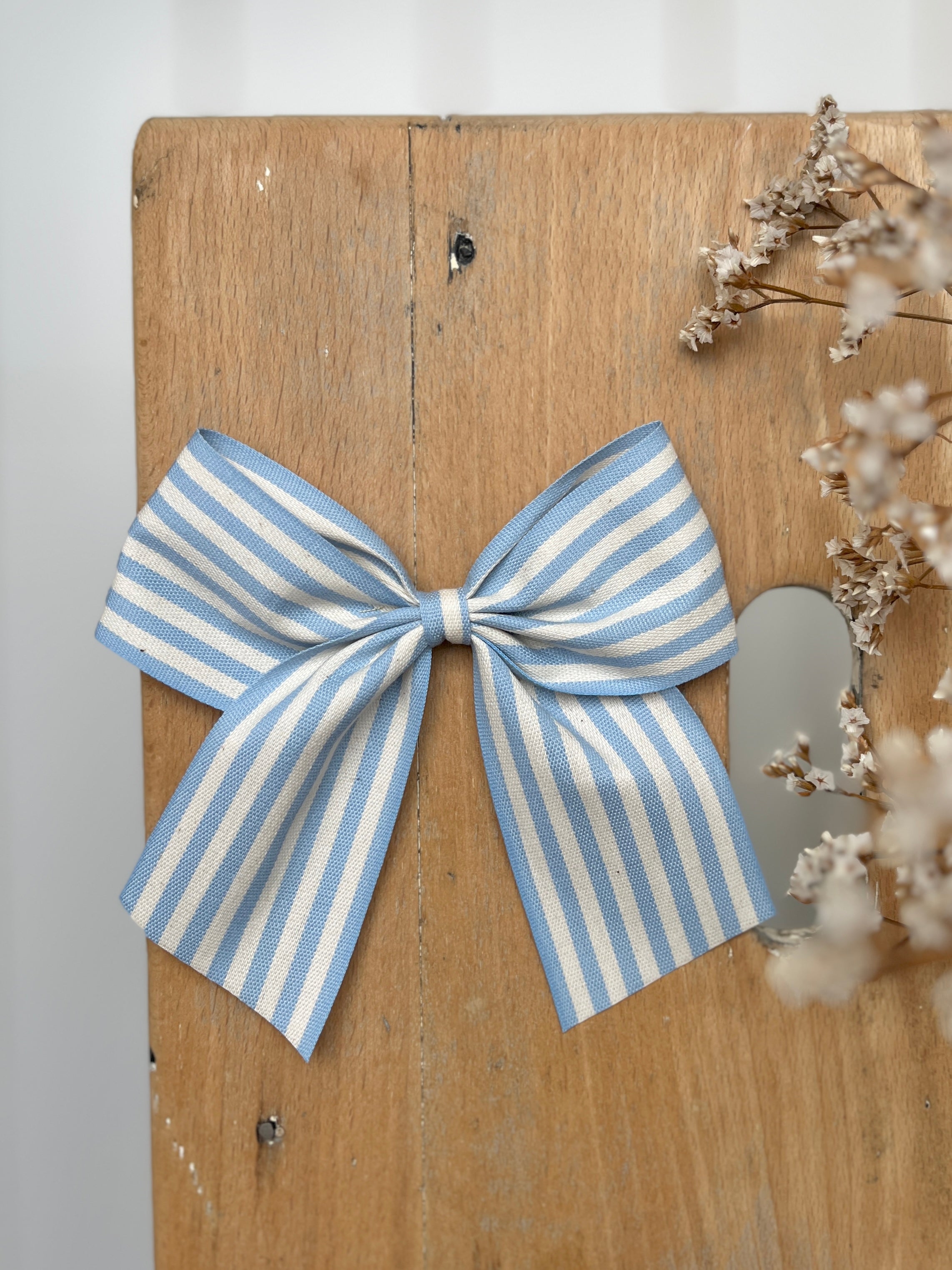 La barrette à gros noeud Brunette rayures transat bleu (taille XL)