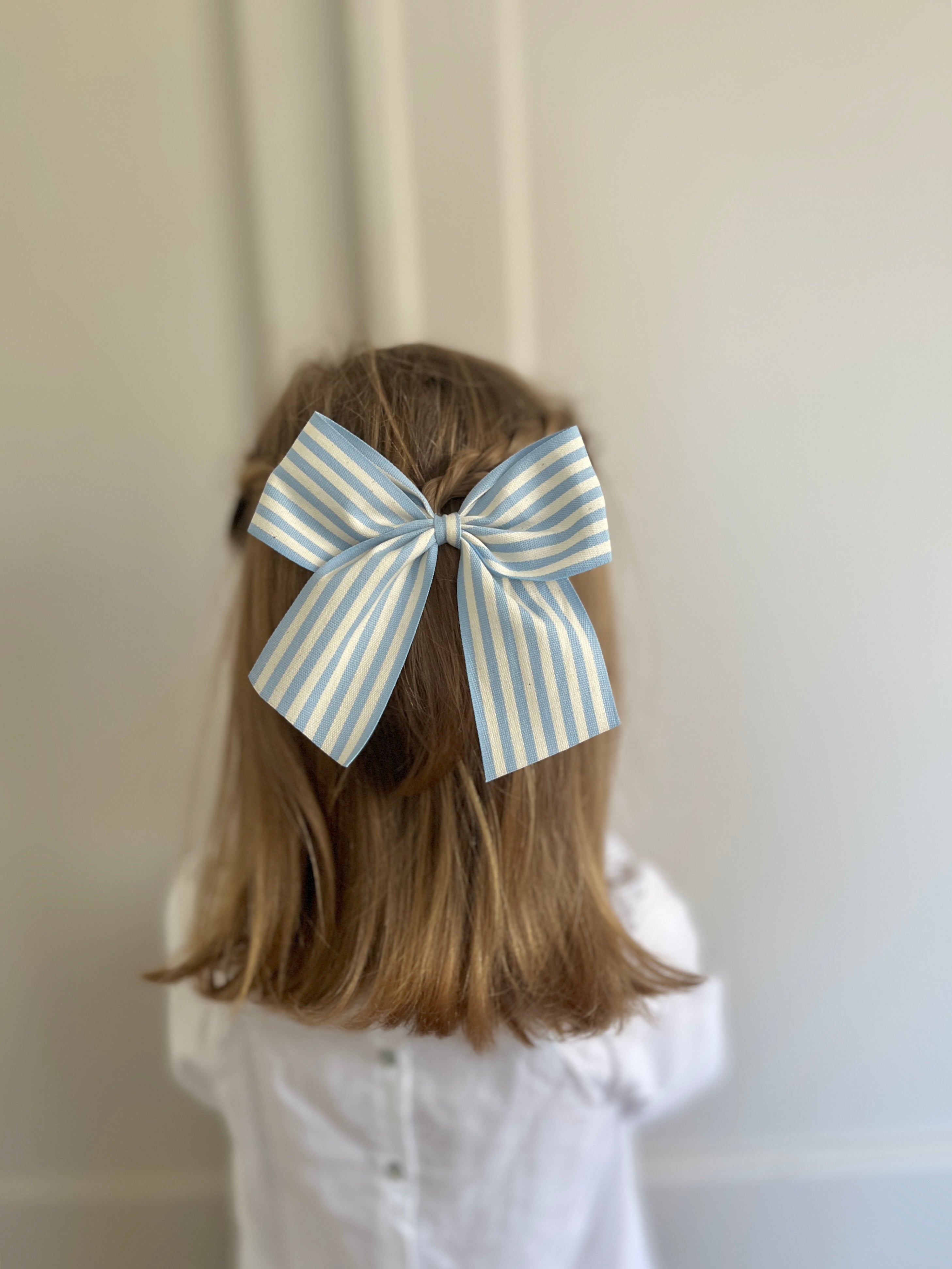 La barrette à gros noeud Brunette rayures transat bleu (taille XL)