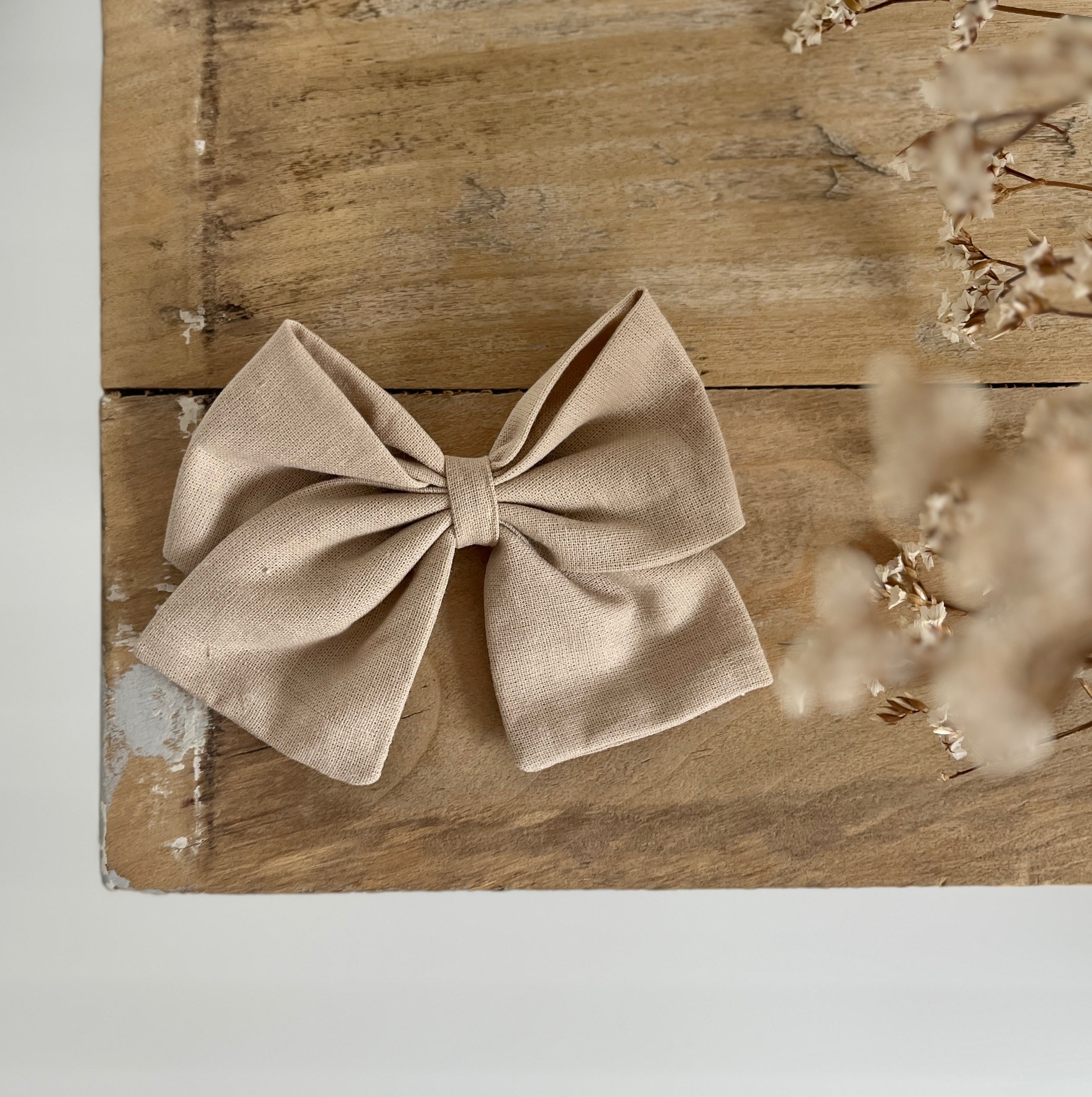 La barrette à gros noeud Brunette unie beige crème