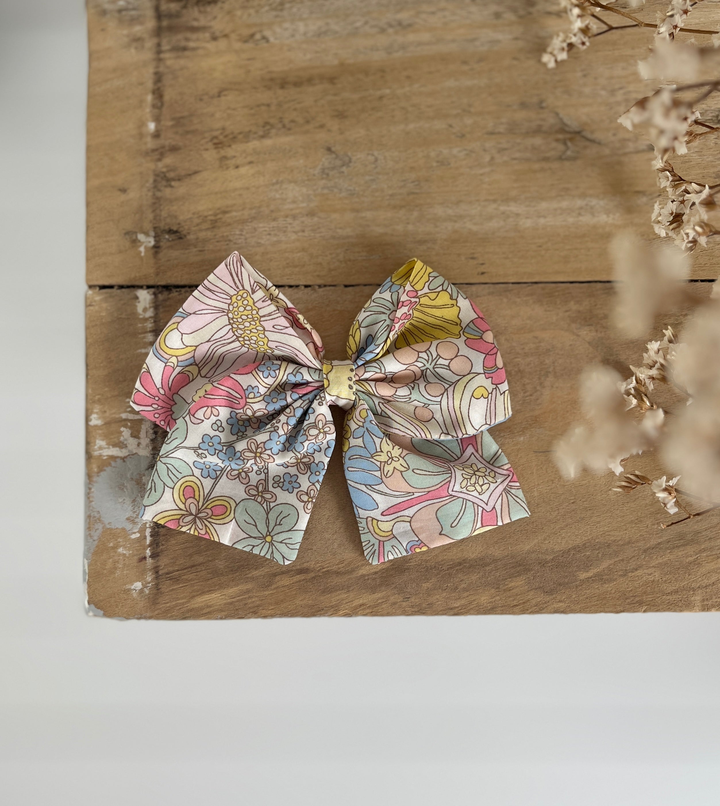 La barrette à gros noeud Brunette Liberty Tutti Frutti