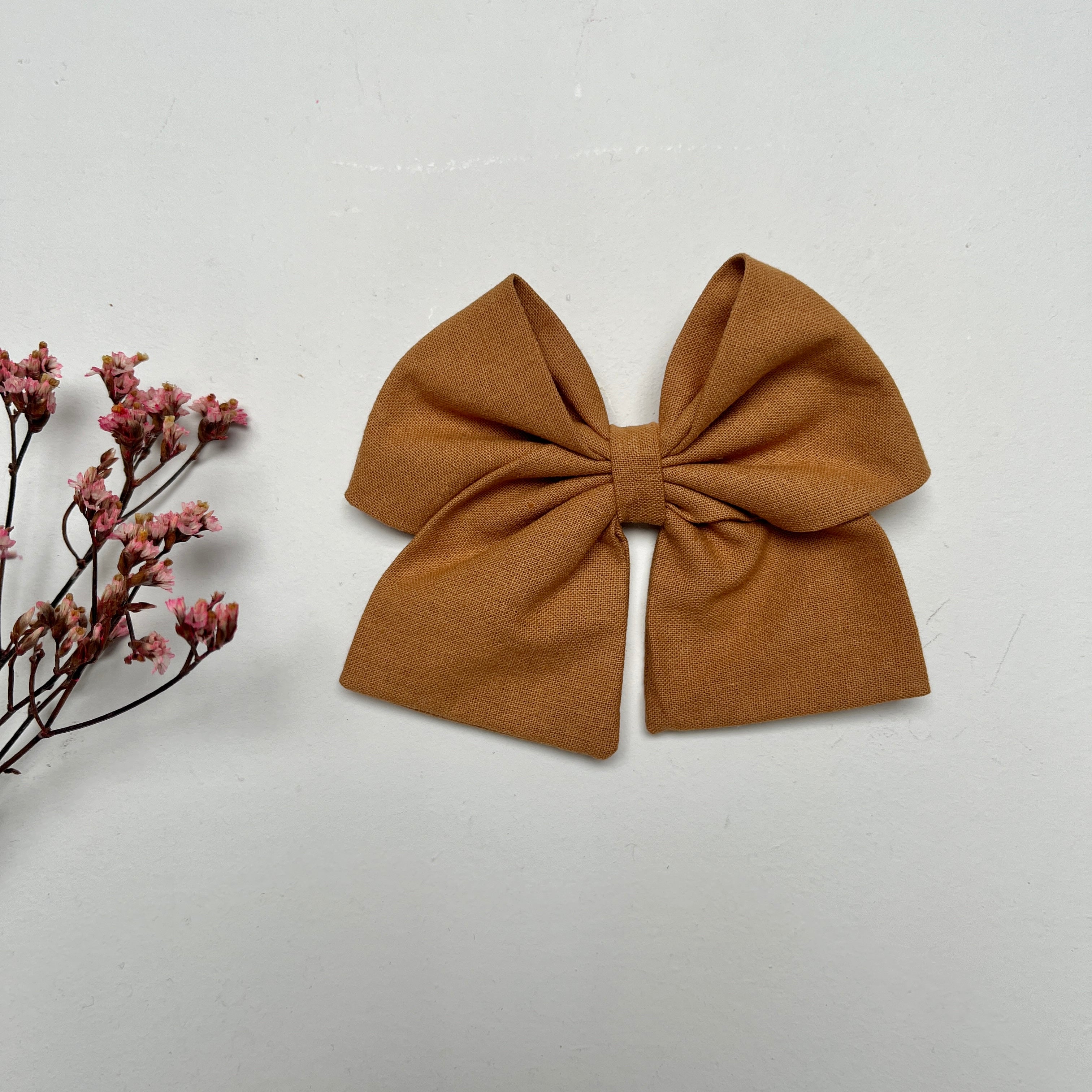 La barrette à gros noeud Brunette unie caramel