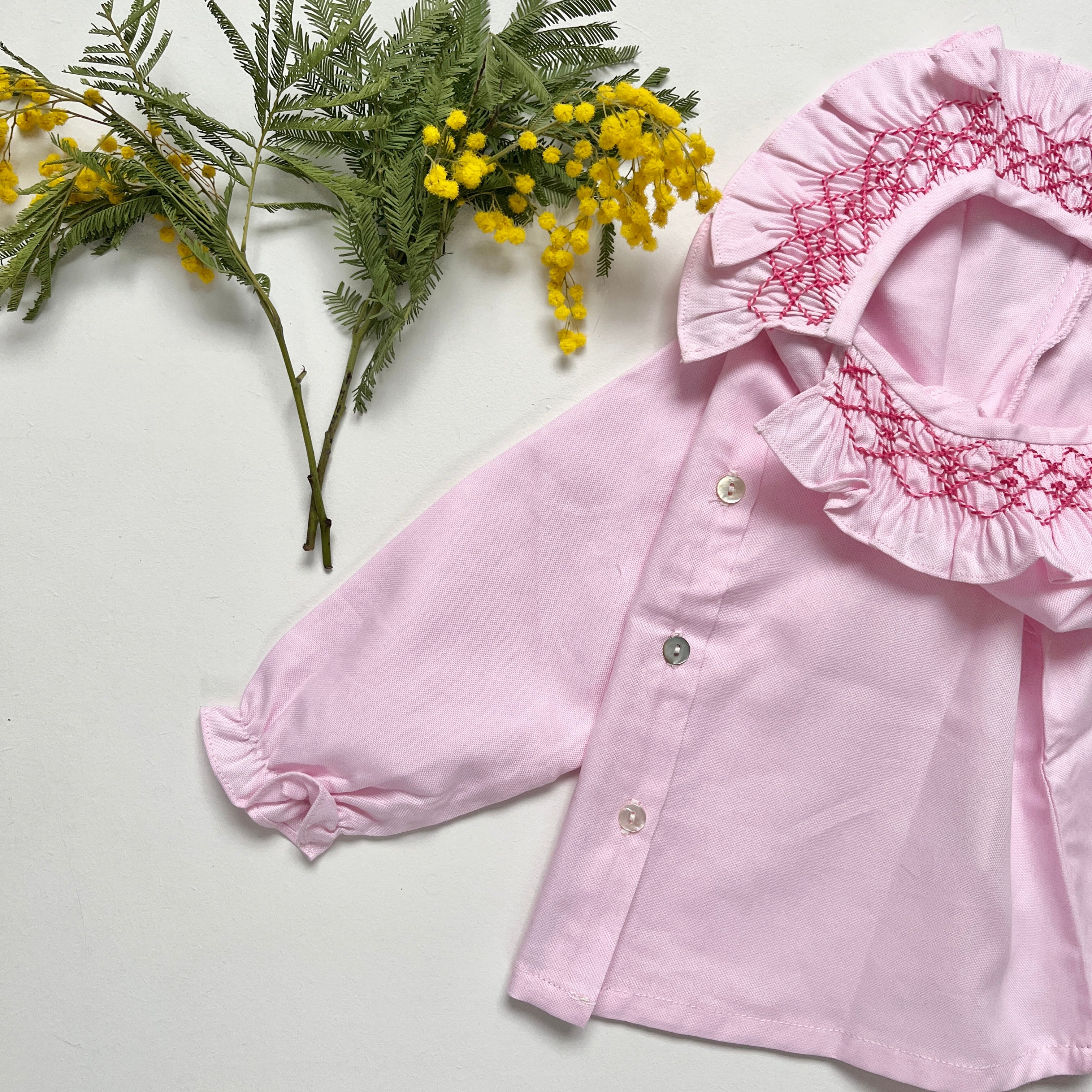 La blouse au col volanté smocké rose Dauphine