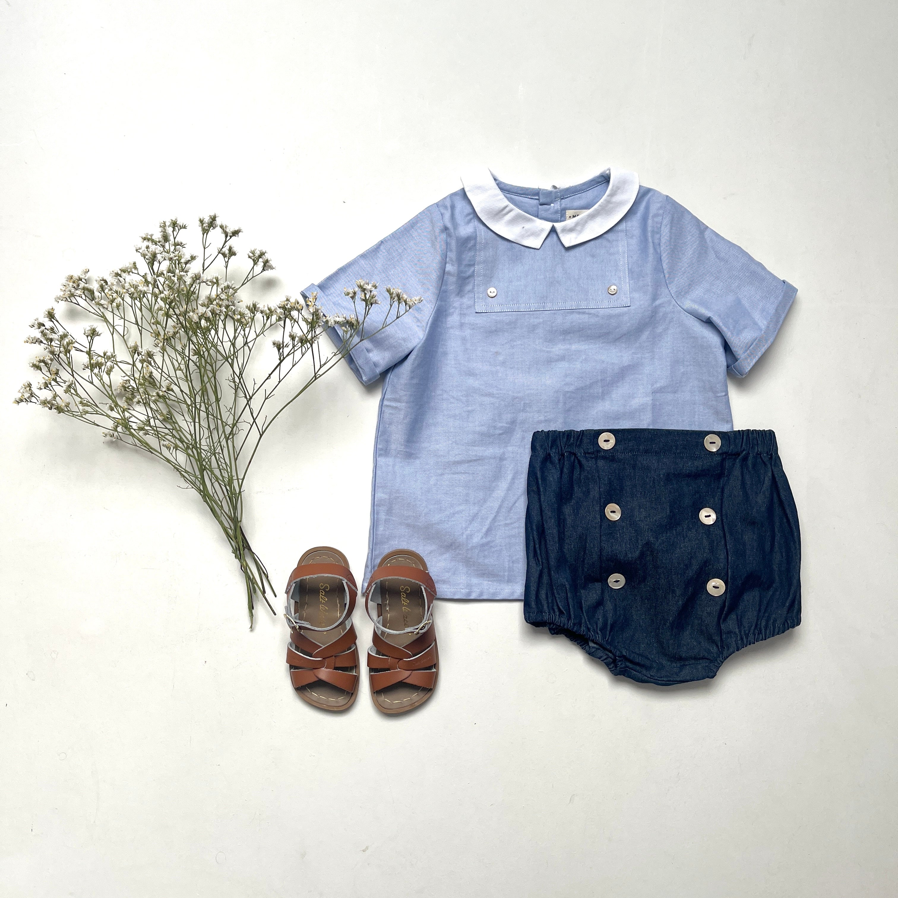 La blouse à plastron César bleue
