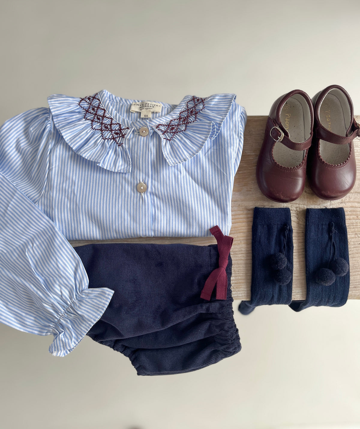 La blouse à grand col volanté smocké bordeaux Margaux