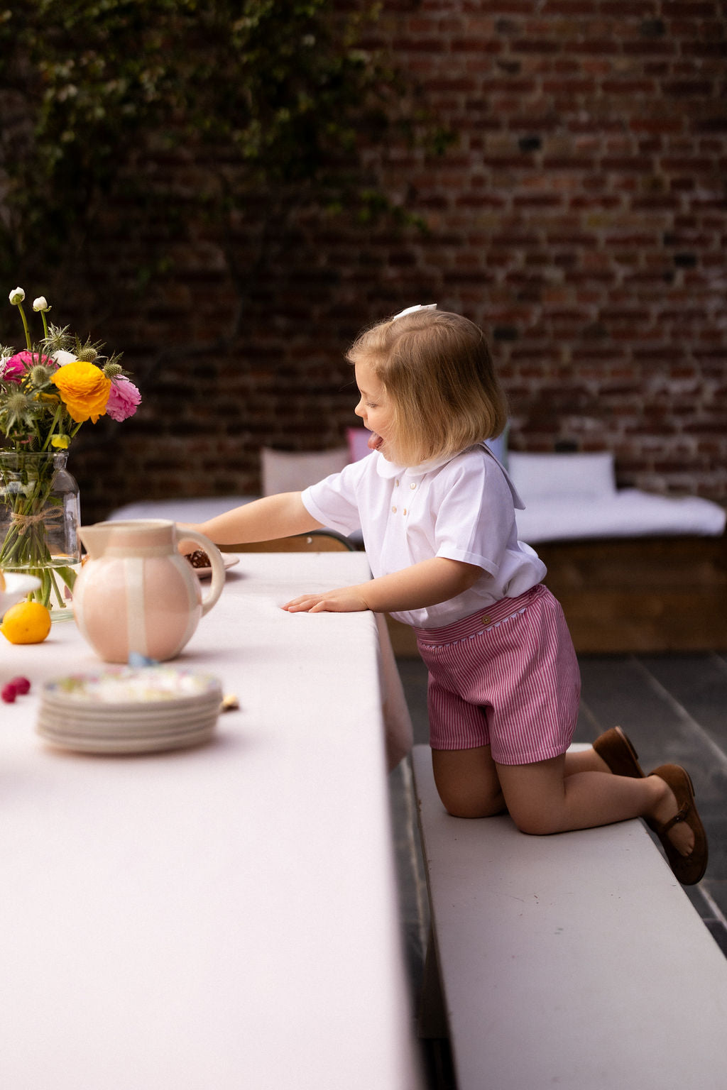 Joseph, le short à bretelles en denim rayé rose
