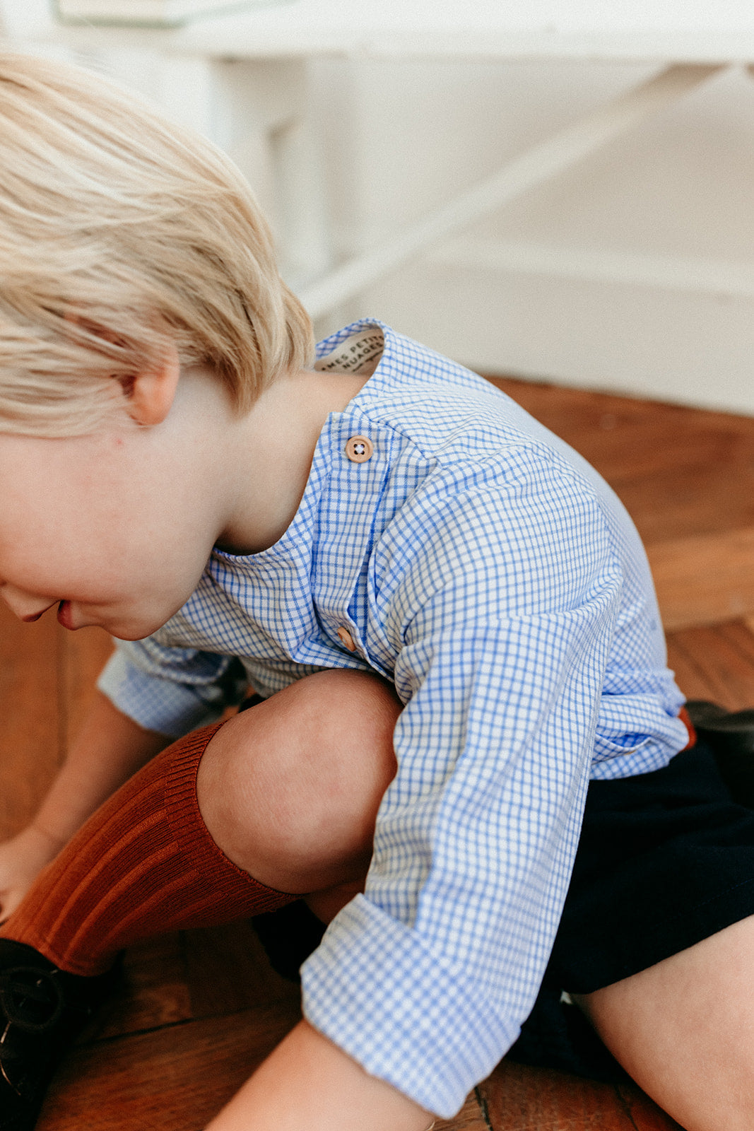 La blouse Jean avec la patte de boutonnage côté