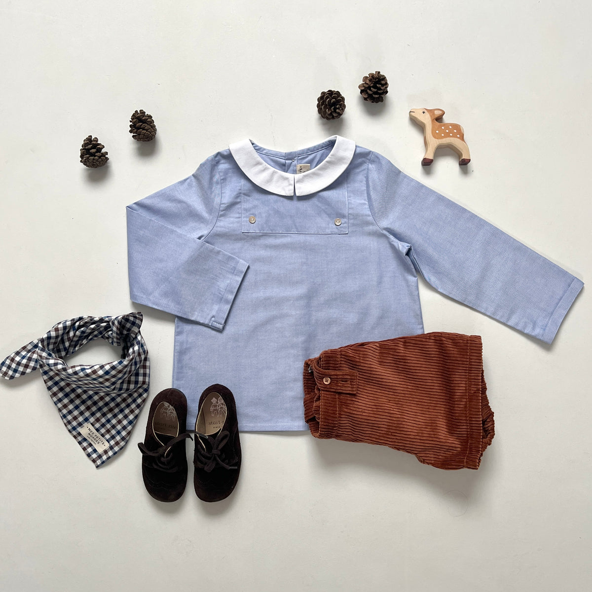 La blouse à plastron César bleue
