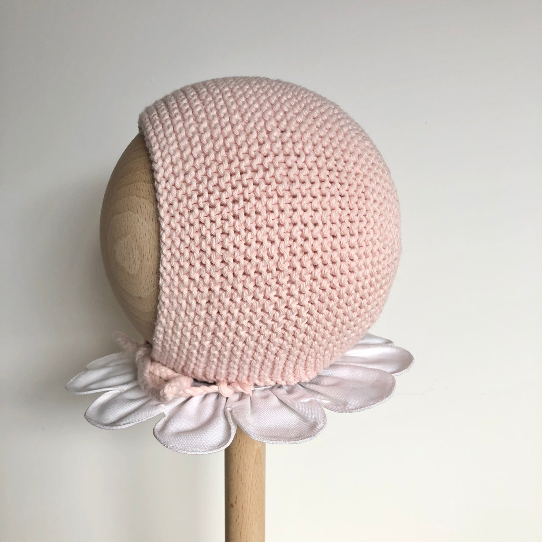 Le béguin Clotaire en coton rose pâle
