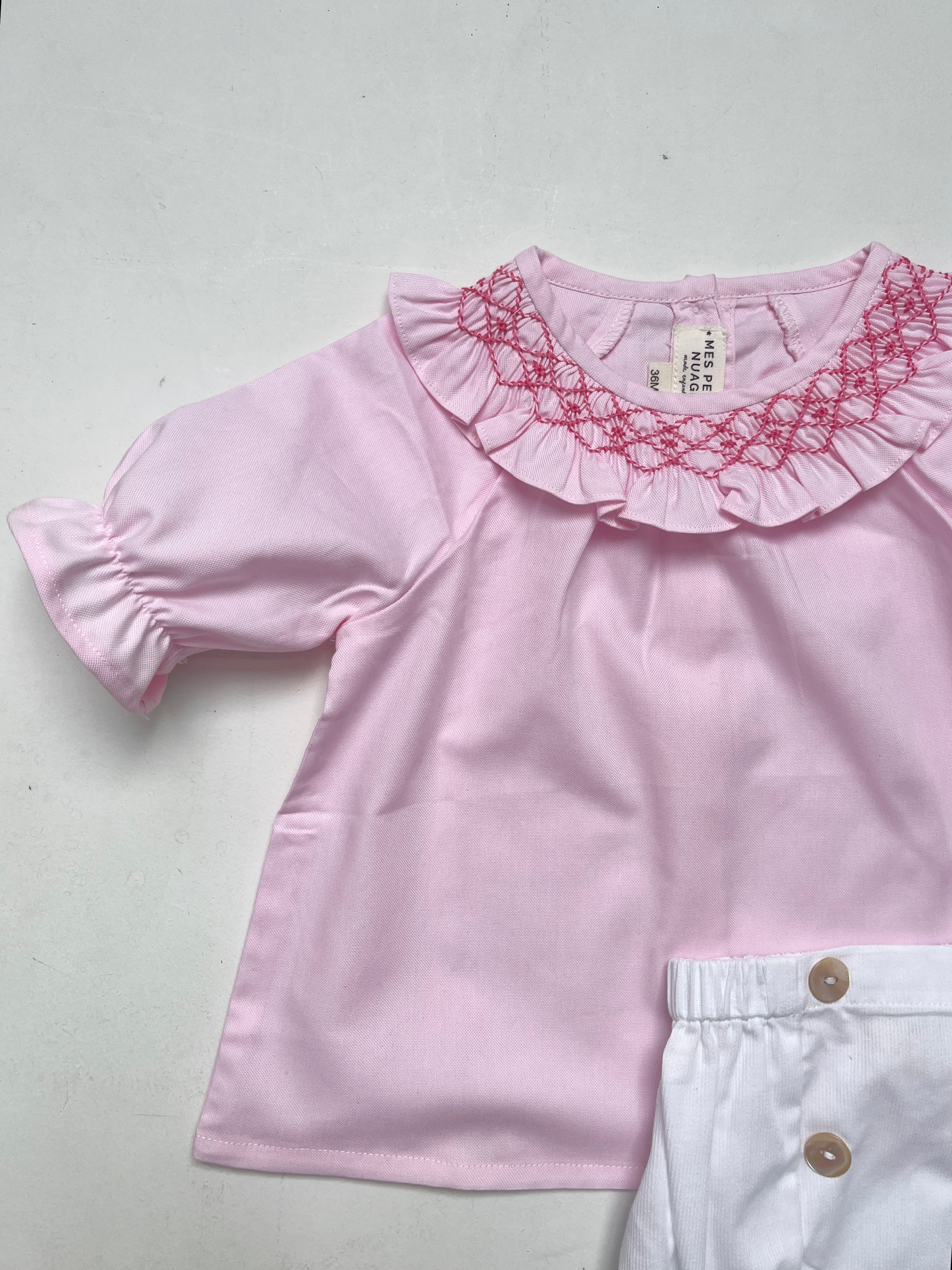 La blouse au col volanté smocké rose Dauphine