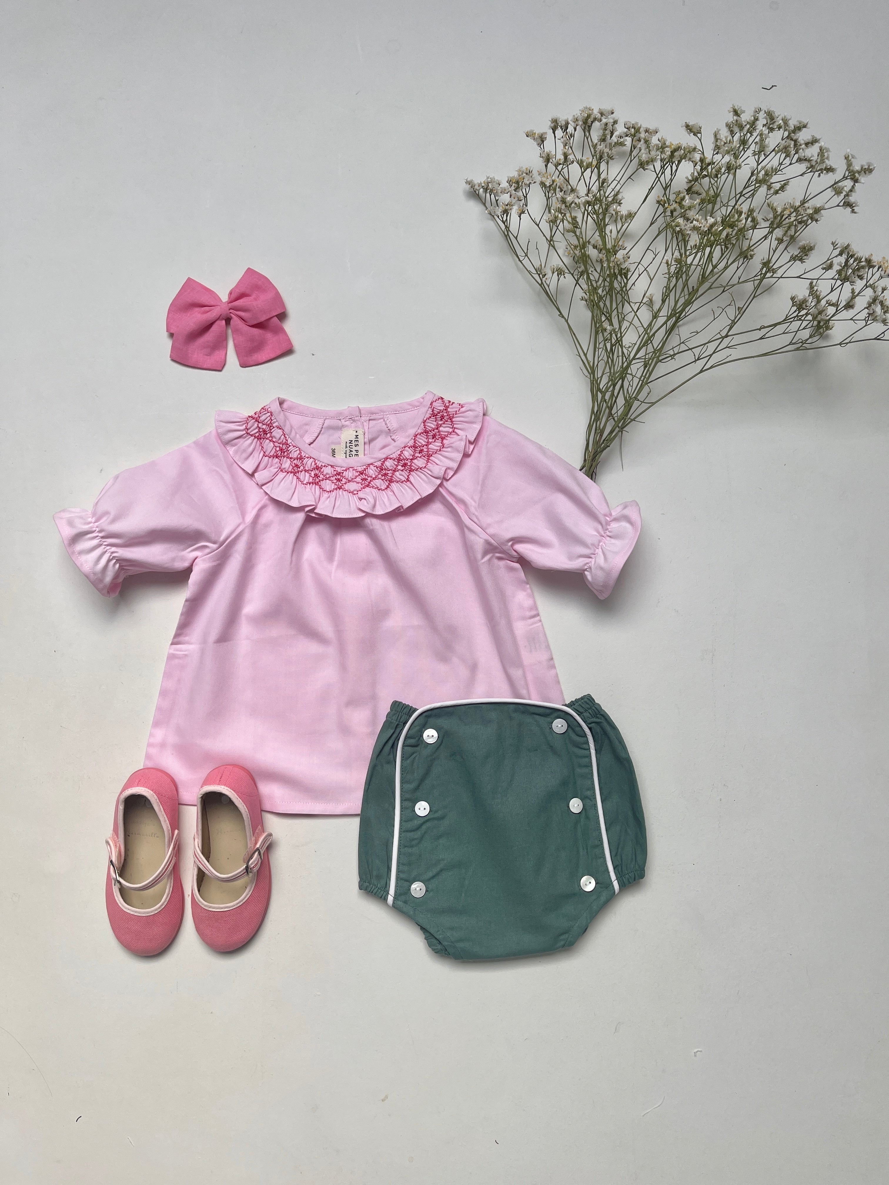 La blouse au col volanté smocké rose Dauphine