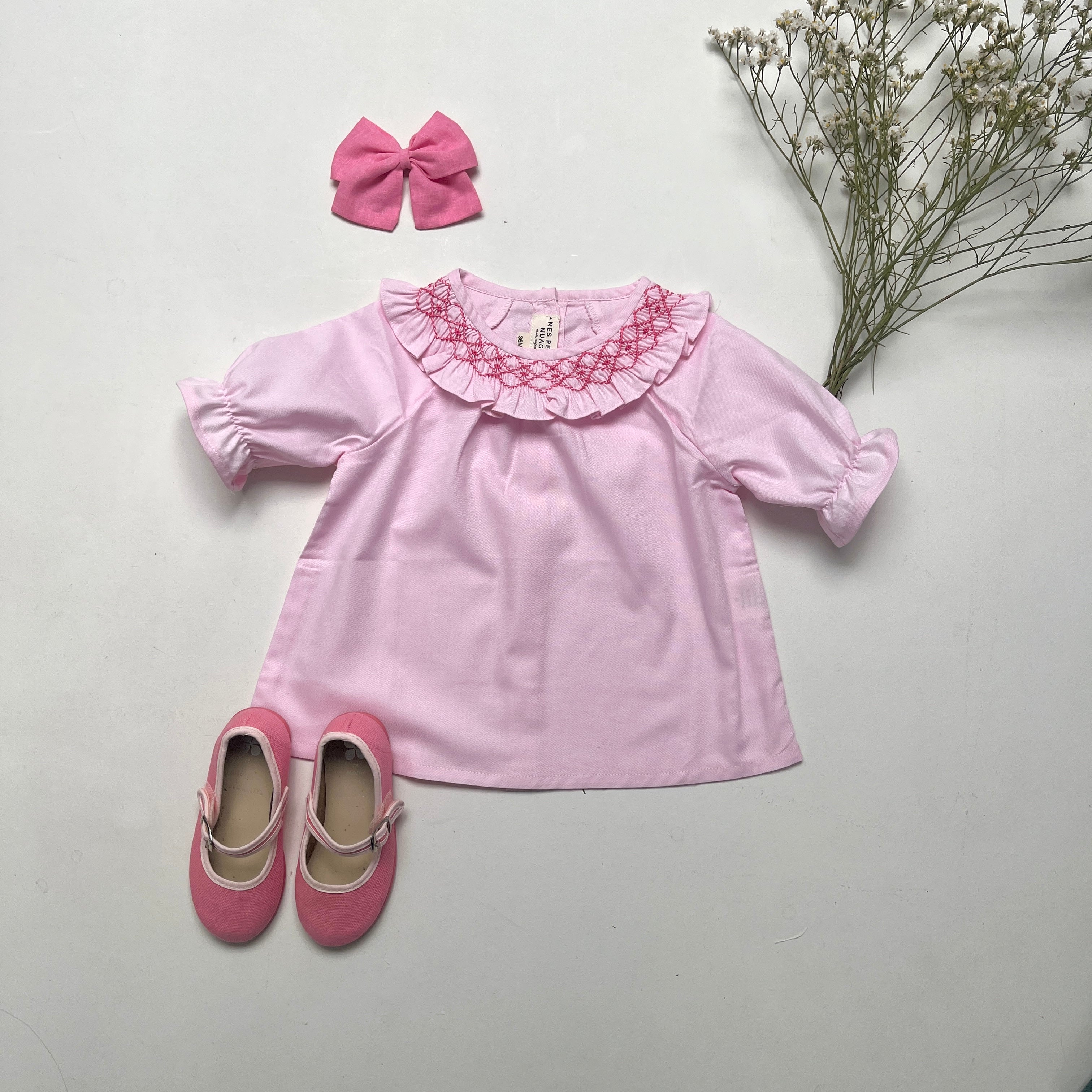 La blouse au col volanté smocké rose Dauphine