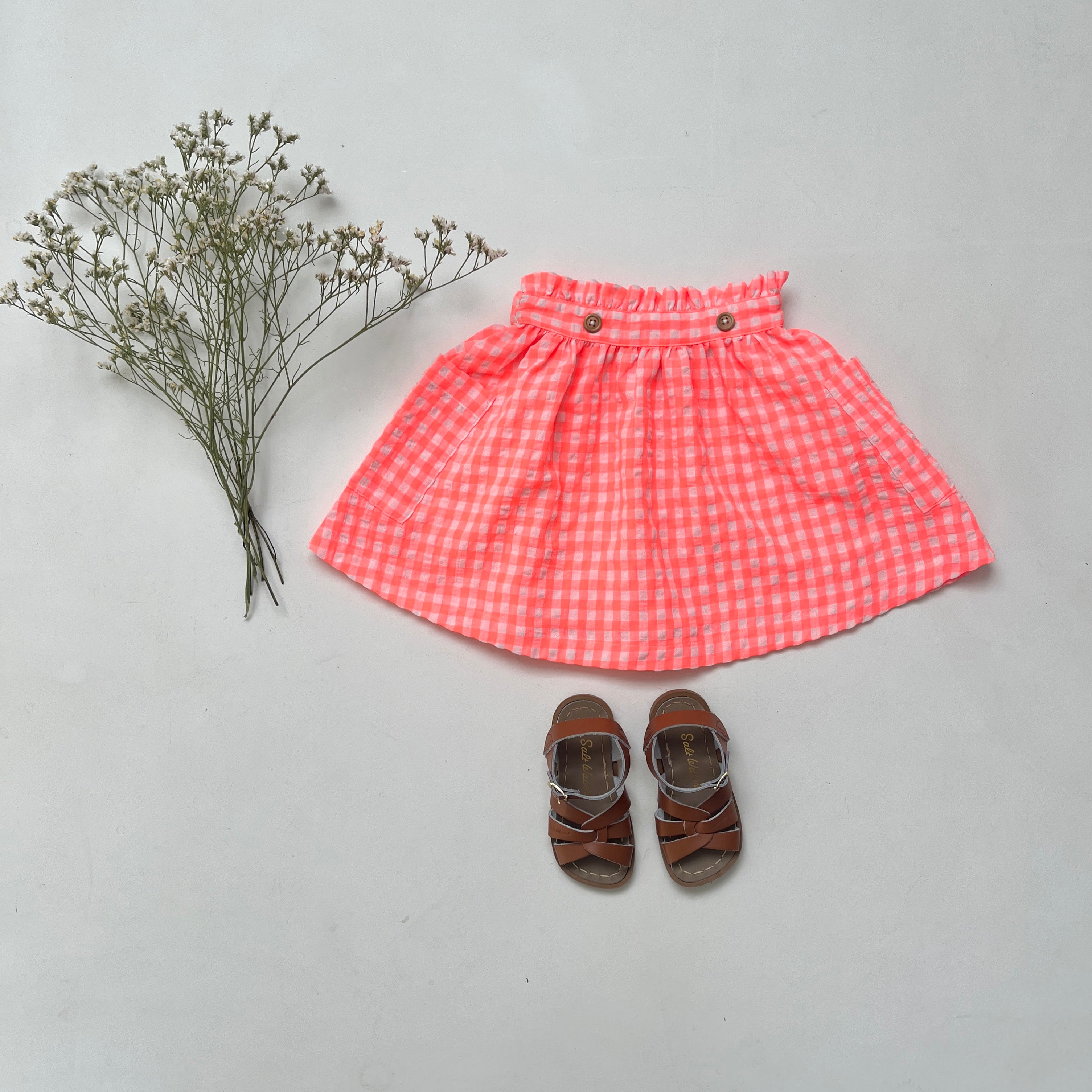 La jupette Annette vichy rose fluo