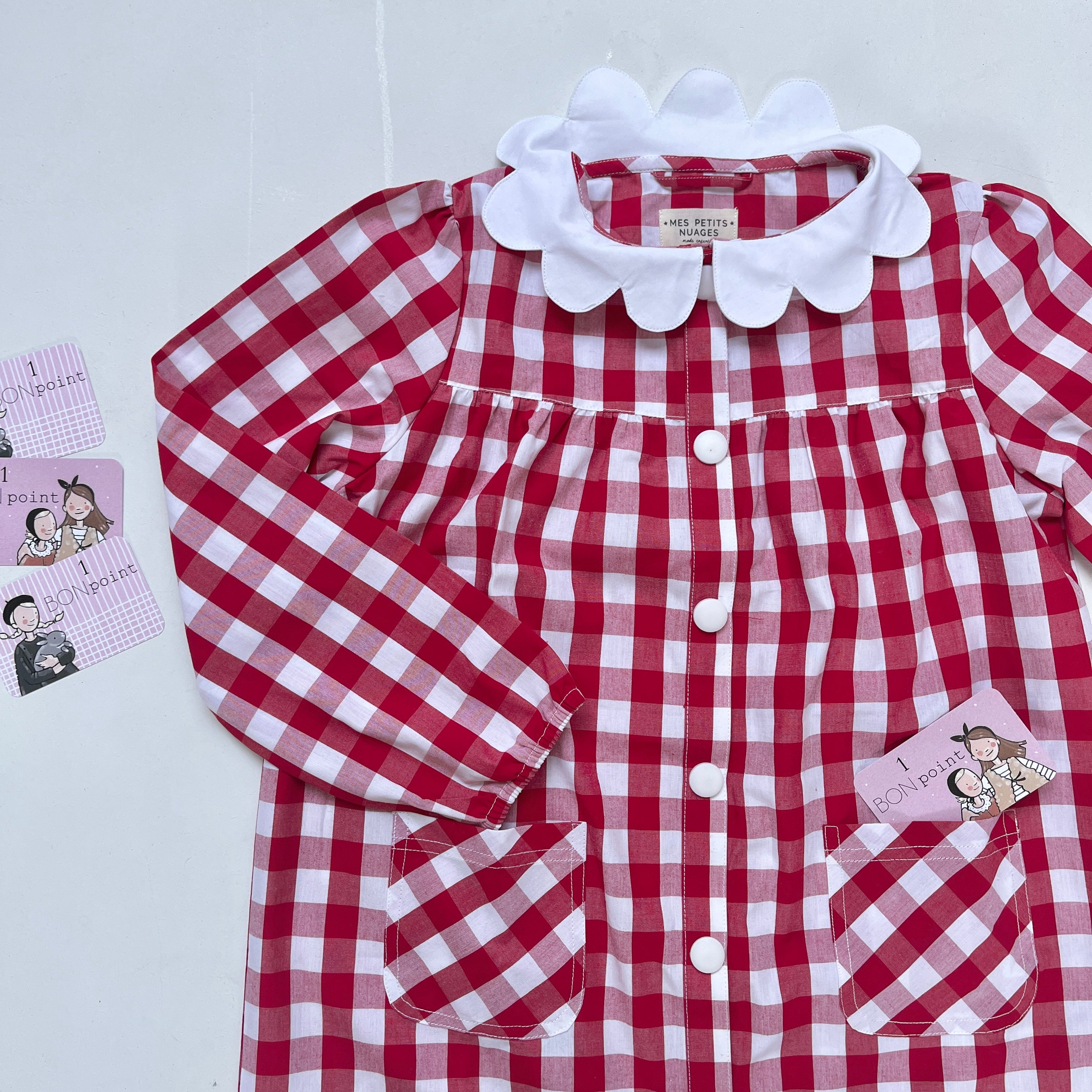 Joséphine, le tablier pour fille vichy rouge à pressions