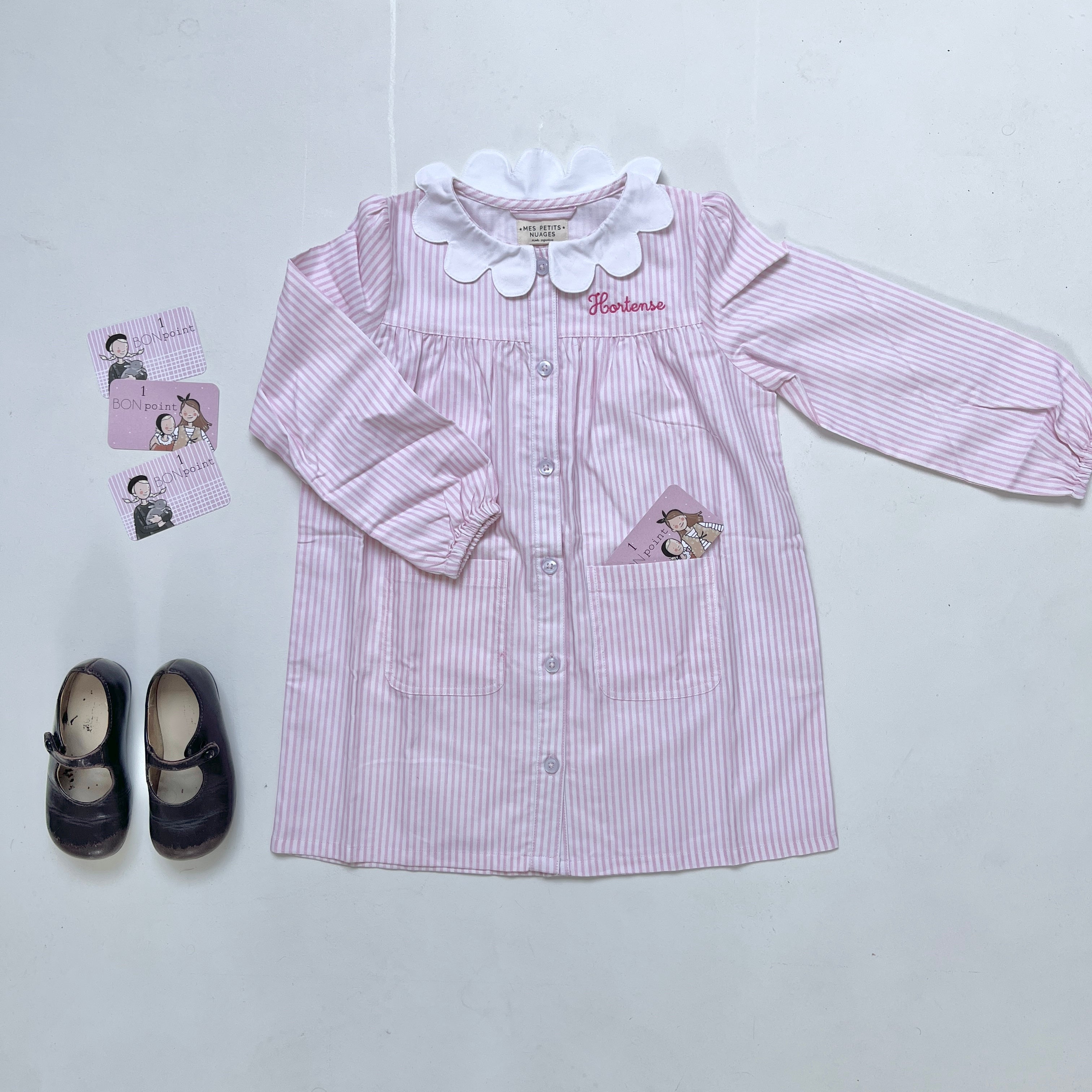 Joséphine, le tablier pour fille rayé rose à boutons
