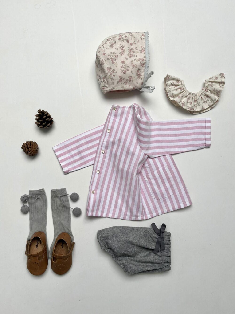 La blouse sans col Barnabé à larges rayures roses