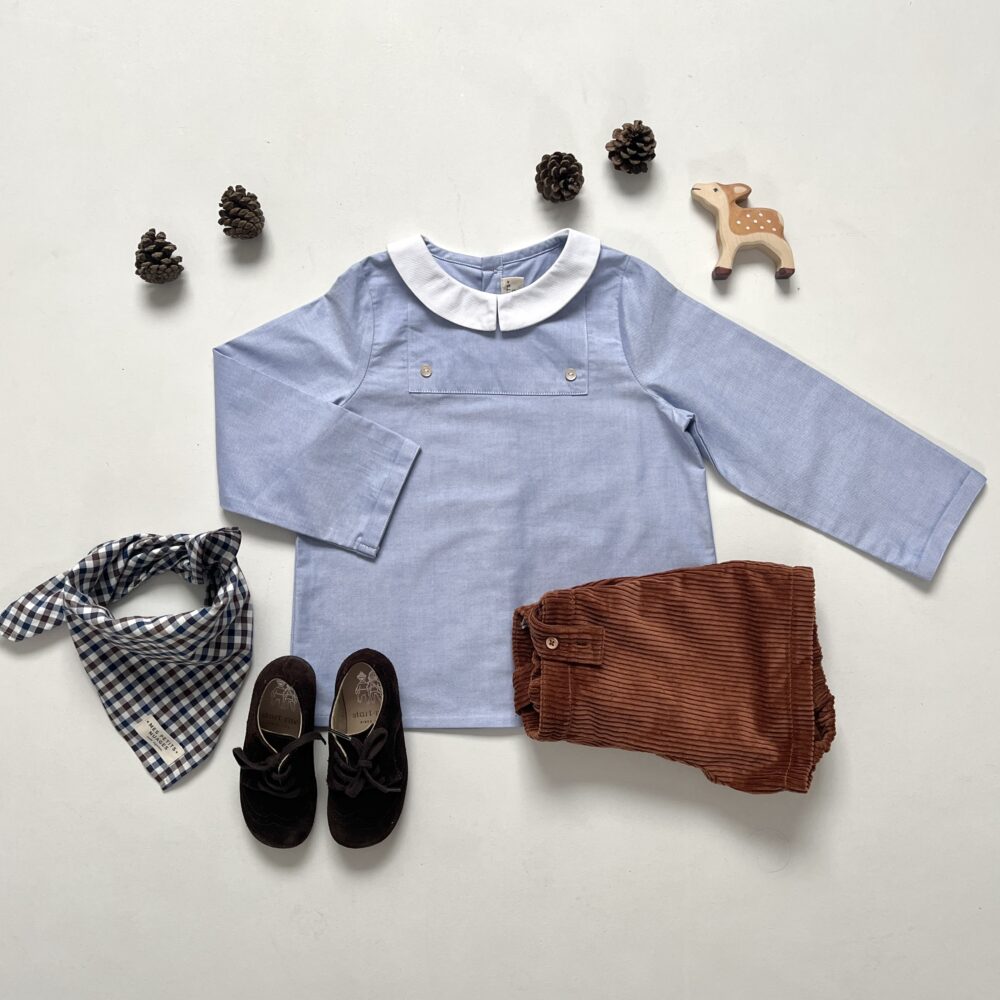 La blouse à plastron César bleu ciel